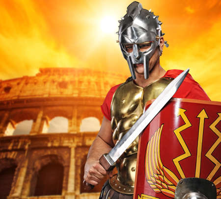 Roman legionary soldier in front of coliseumの写真素材