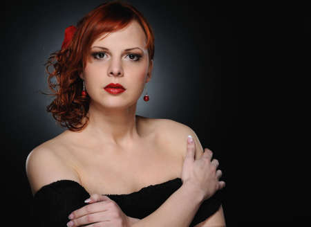 Portrait of an attractive redhead womanの写真素材