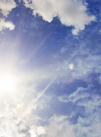 Blue sky with fluffy cloudsの写真素材