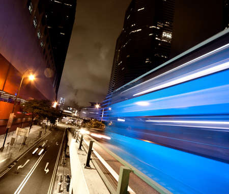 Fast moving bus at nightの写真素材