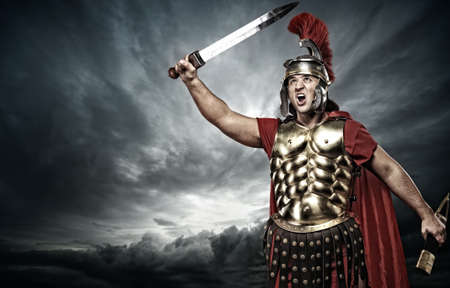 Legionary soldier over stormy skyの写真素材