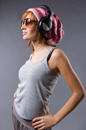 Stylish young girl with headphonesの写真素材