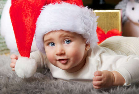 Close-up portrait of a santa babyの写真素材