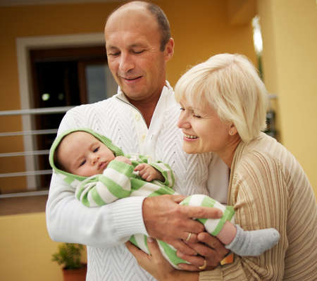 Grandparents with his grandchild