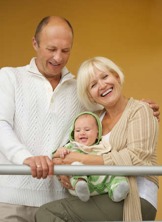 Grandparents with his grandchild