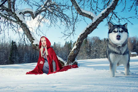 Red Hood with a wolf.