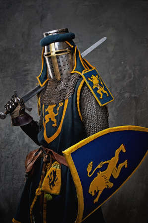 Medieval knight on grey background.の写真素材