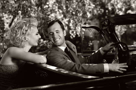 Retro couple in convertible