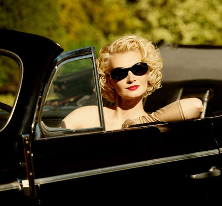 Woman in retro carの写真素材