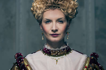 Portrait of beautiful haughty queenの写真素材