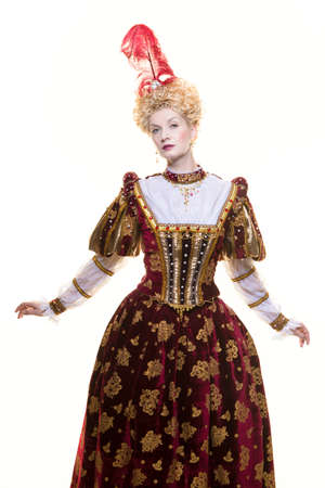 Haughty queen in royal dress isolated on white