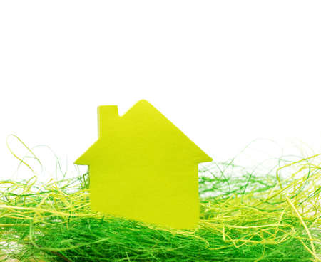 Conceptual paper house isolated on white 