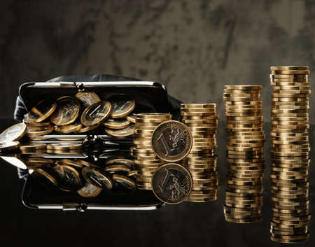 Purse with lot of euro coins の写真素材