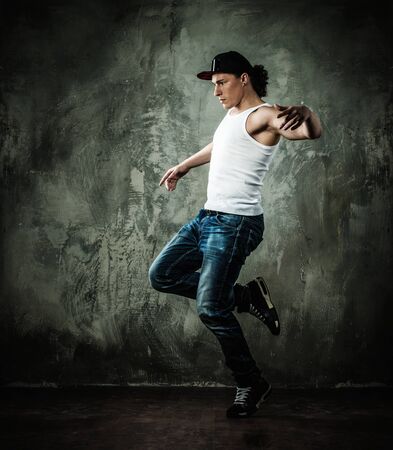 Man dancer showing break-dancing movesの写真素材