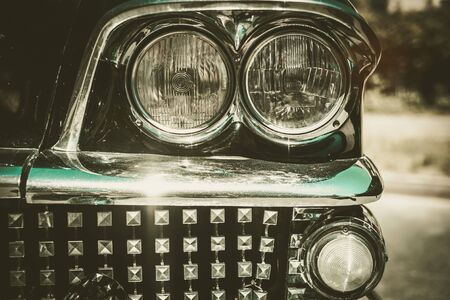 Close-up of retro car facia with chrome grilleの写真素材