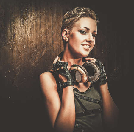 Attractive steampunk girl with headphones