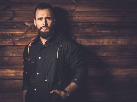 Handsome man with beard  wearing waxed canvas jacketの写真素材