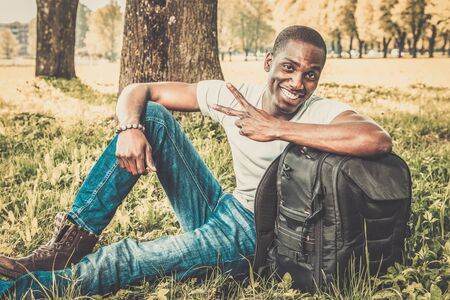 Young african american man in a parkの写真素材