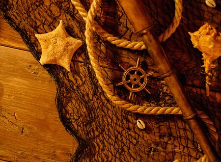 Sea concept on a wooden table backgroundの写真素材