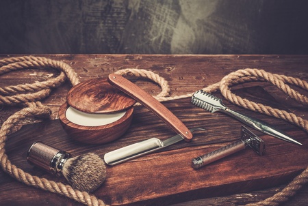 Shaving accessories on a luxury wooden backgroundの写真素材