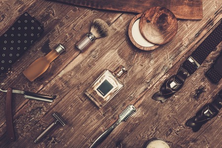 Gentleman's accessories on a on a luxury wooden board