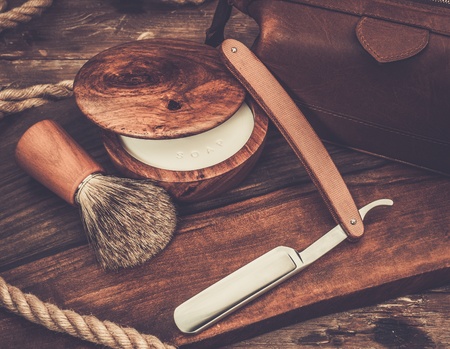 Shaving accessories on a luxury wooden backgroundの写真素材