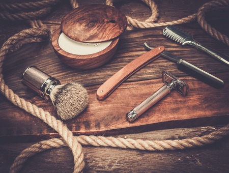 Shaving accessories on a luxury wooden backgroundの写真素材