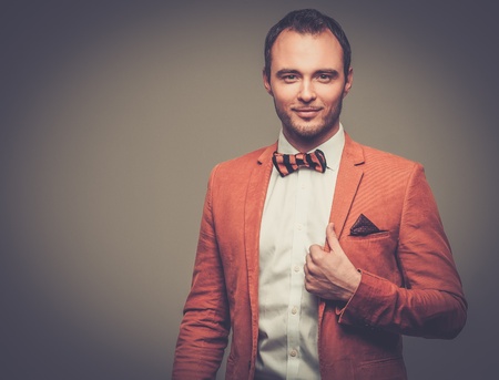 Sharp dressed fashionist wearing jacket and bow tie