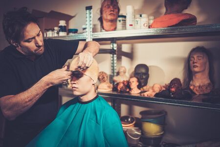 Men during lifecasting process in a prosthetic special fx workshop