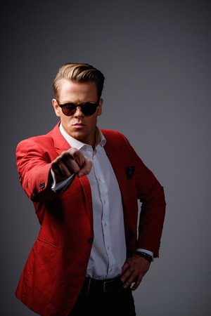 Stylish man in red jacketの写真素材