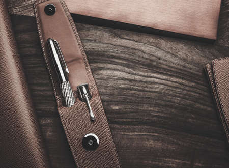 Luxurious rollerball pen on a wooden backgroundの写真素材