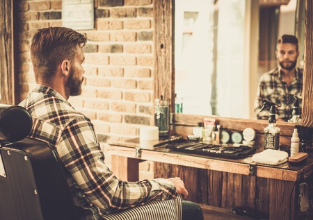 Stylish man in a barber shop