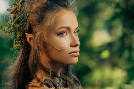 Elf woman in a magical forestの写真素材