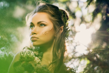 Elf woman in a magical forestの写真素材