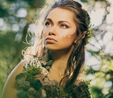 Elf woman in a magical forestの写真素材