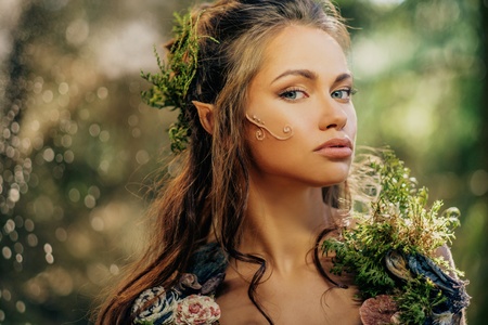 Elf woman in a magical forestの写真素材