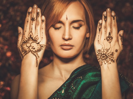 Woman with traditional mehndi henna ornamentの写真素材