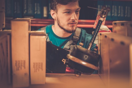 Worker on a automotive spare parts warehouseの写真素材