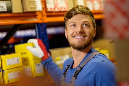 Worker on a automotive spare parts warehouseの写真素材