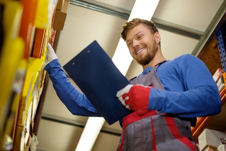 Worker on a automotive spare parts warehouseの写真素材