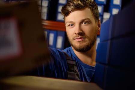 Worker on a automotive spare parts warehouseの写真素材