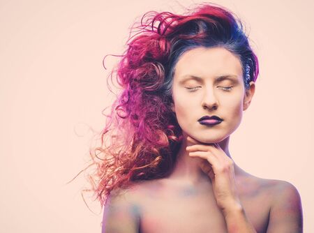 Beautiful woman with magnificent galaxy hairの写真素材