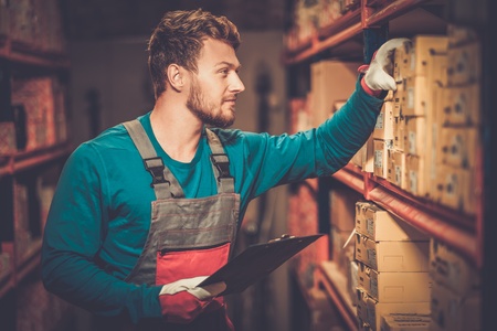 Worker on a automotive spare parts warehouseの写真素材