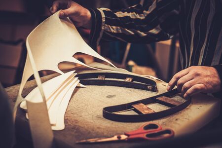 Shoemaker performs shoes in the studio craft.