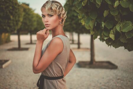 Young lady in a beautiful alleyの写真素材
