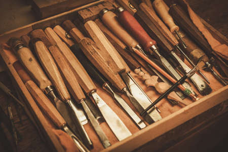 Close-up of the carpenter tools in restorer workshop.の写真素材