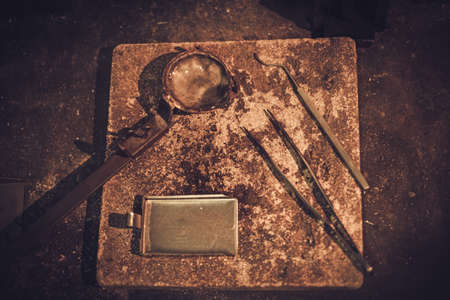 Different goldsmiths tools on the jewellery workplace.の写真素材