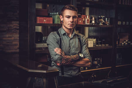 Professional hairstylist in barbershop interiorの写真素材