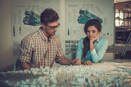 Confident team of engineers working together in a architect studio.の写真素材