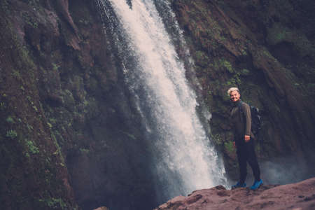 Cheerful adventurer near Ouzoud waterfall in Morocco.の写真素材